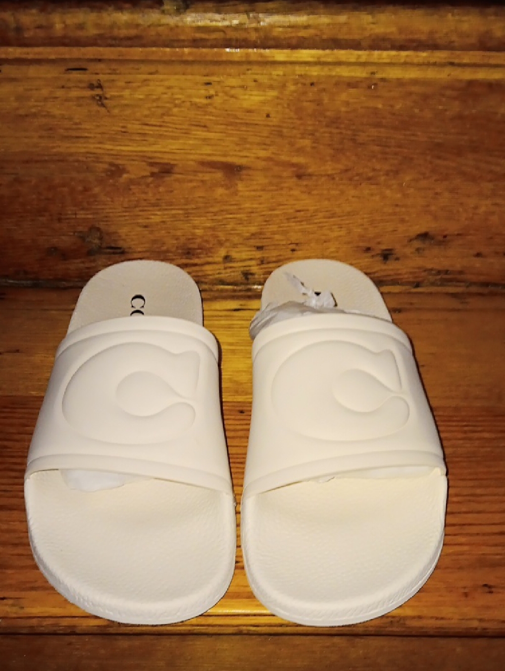 White Slide Sandals with Embossed C Logo